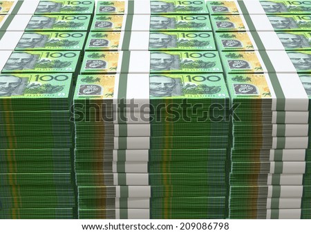 A pile of wads of australian dollar banknotes on an isolated background