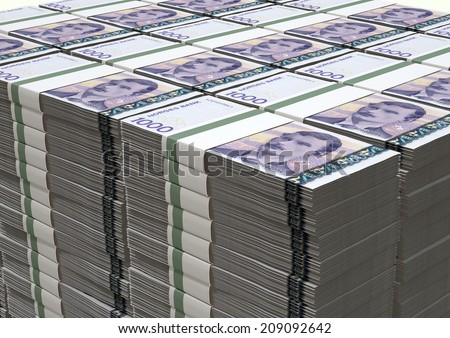 A stack of bundled Norwegian Krone banknotes on an isolated background
