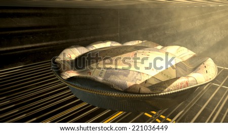 A closeup concept of a money pie made with British Pound bank notes baking in a heated oven