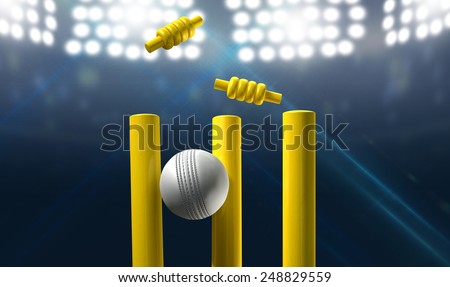 A white leather cricket ball hitting yellow wooden cricket wickets on a floodlit stadium background at night