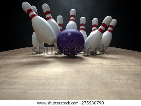 An arrangement of white and red used vintage bowling pins being struck by a bowling ball on a wooden bowling alley surface on a dark background