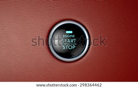 A closeup of a modern car start and stop button with blue lights on a red leather textured surface