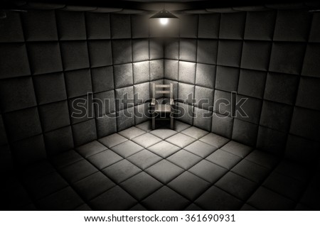 A dark dirty white padded cell in a mental hospital with an empty chair in the corner lit by a single spotlight