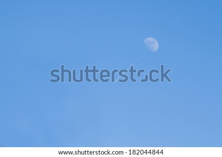Moon shooted by plane in middle of the day