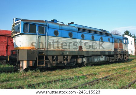 Old abandoned  trains at depot in sunny day