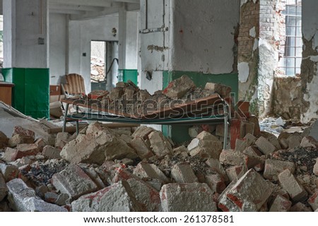 Photo from demolition  textile  factory, broken table
