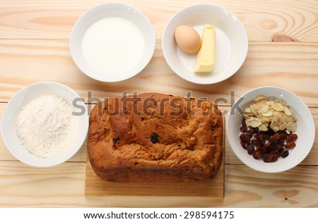 Sweet bread  with raisins and almonds,flour, butter,egg, milk.