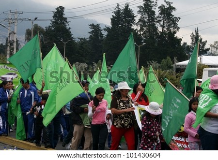 QUITO, ECUADOR - MAY 01: People marching in the parade on International Workers Day, also known as Labour Day, on may 01, 2012 in Quito, Ecuador