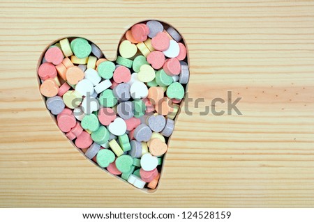 Valentine candy with heart shape and open space for design