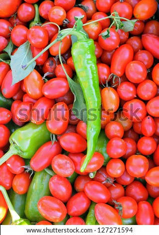green pepper and cherry tomatoes in market place