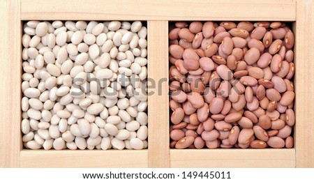pink and white beans in wooden box