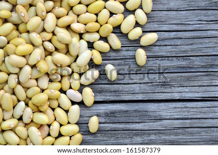 Peruvian Canary (Peruano) Beans on grunge table