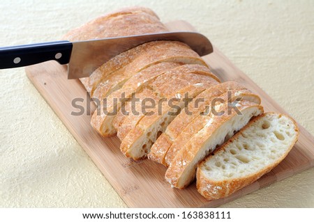 cutting flat bread with knife