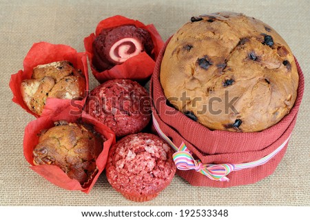 mini muffins and big cake on burlap