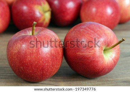 group of fresh gala apple on rustic table