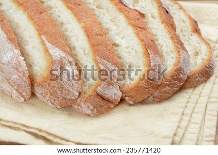 slice of fresh baked Italian bread on table