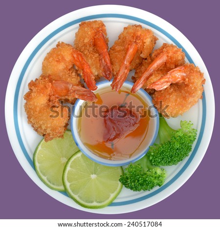 fried coconut shrimp with sauce and vegetable in plate