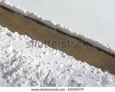 clean walking path through snow