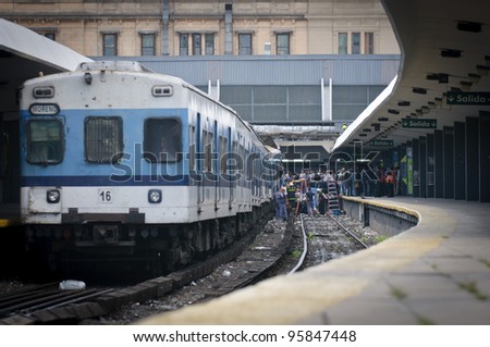 BUENOS AIRES, ARGENTINA - FEB 22: Rescuers work on the site a the train crash at Once\'s train station in Buenos Aires on February 22, 2012.