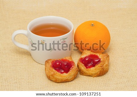 tea breakfast Green tea, danish pastry and orange