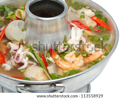 Tom Yum seafood soup  or spicy tom yum seafood soup ,Thai  food favorite on white background