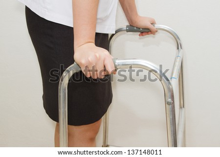 woman using a walker,walking aid