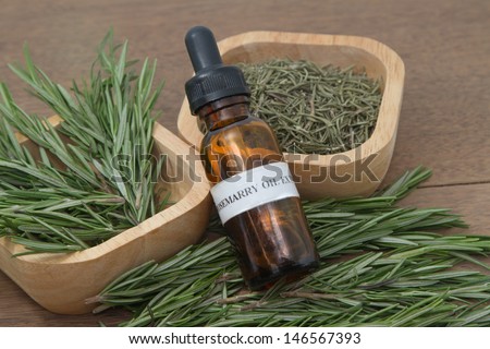 Rosemary herb and aromatherapy  essential oil dropper bottle ,for spa treatment