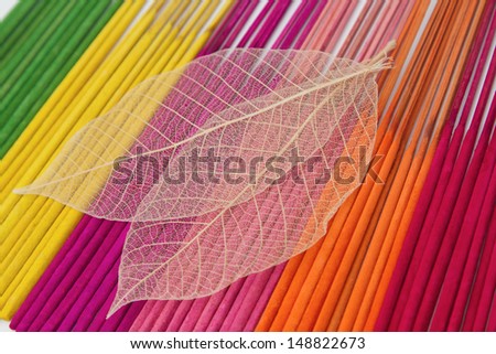 Colorful aroma  incense sticks for spa treatment with dry leave