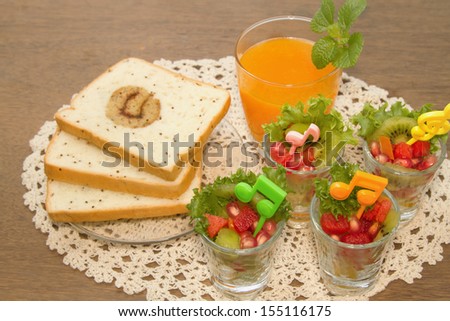 Fresh fruit salad with orange juice, fusion food for diet