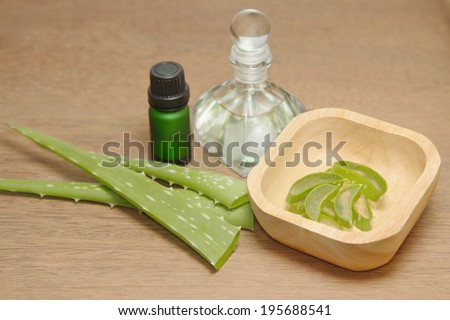 Bottle of aloe vera essential oil with fresh plant , For  beauty spa  and  treatment