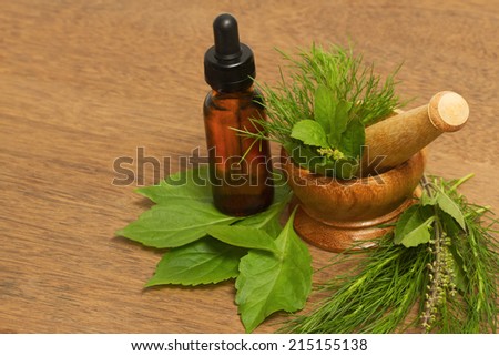 bottles of herbal essences and fresh herbal