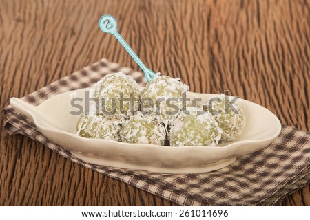 Thai Dessert, Stuffed Coconut Balls made from Sweet Sticky rice and coconut dumpling with caramelized