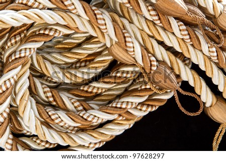 pile of the silk rope curtain tassels.