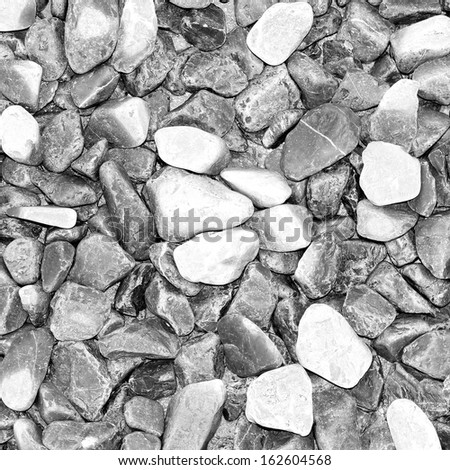 black and white rivers stone background or texture.