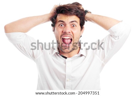 screaming shocked young man with hands on head, isolated on a white