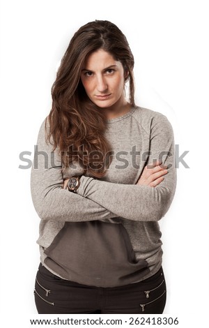 young angry woman with arms crossed