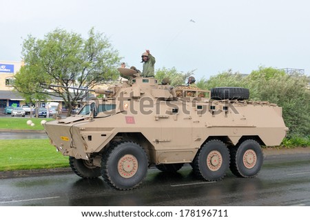 BLOEMFONTEIN, SOUTH AFRICA - February 2014: The Armed Forces parade the streets of Bloemfontein on February 21st, 2014 to commemorate World Armed Forces Day. Ratel infantry fighting vehicle drive by