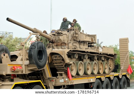 BLOEMFONTEIN, SOUTH AFRICA - February 2014: The Armed Forces parade the streets of Bloemfontein on February 21st, 2014 to commemorate World Armed Forces Day. Olifant main battle tank drive by