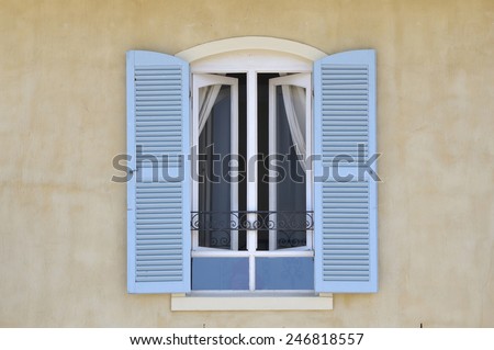Window with louvre doors in Hermanus, Western Cape Province of South Africa