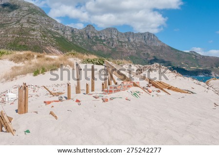CAPE TOWN, SOUTH AFRICA - DECEMBER 12, 2014: Old police station at Hout Bay reclaimed by sand dunes, Cape Town, South Africa.