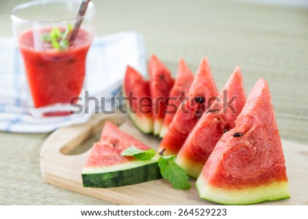 Fresh watermelon and glass of watermelon juice,selective focus on slices of watermelon