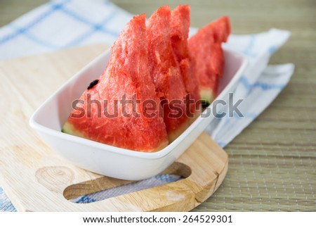 Fresh watermelon and glass of watermelon juice,selective focus on front
