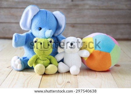 The dolls on wooden table