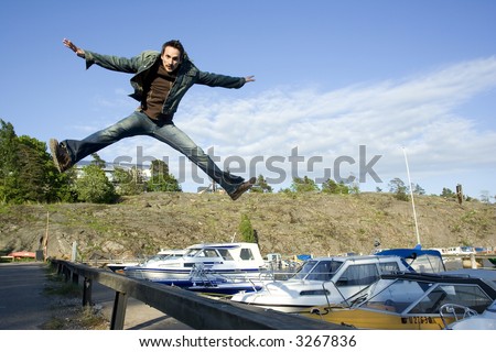 Man jumping by the sea