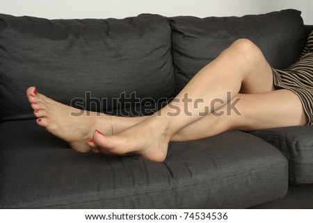 Woman legs lying down relaxing