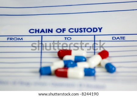 evidence bag with pills on top of it