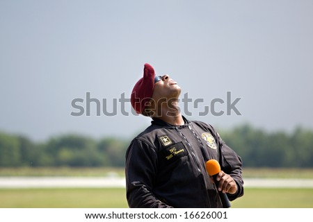 INDIANAPOLIS - AUGUST 24: A member of the Golden Knights Parachute team narrates the show after landing at the Indy air show on August 24, 2008 in Indianapolis,Indiana