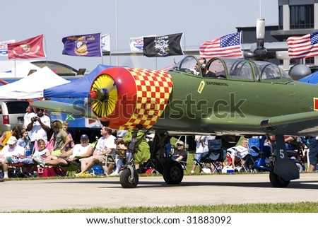 INDIANAPOLIS - JUNE 5: A plane sits on the runway at the Indy air show at Mt. Comfort airport on June 5th, 2009 in Indianapolis,Indiana