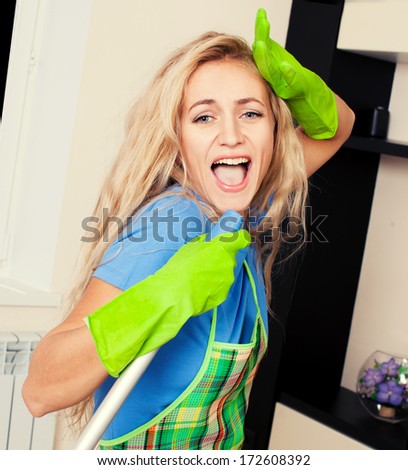 Funny woman with mop. Female cleaning home