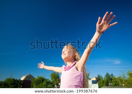 Freedom. Child with outstretched arms